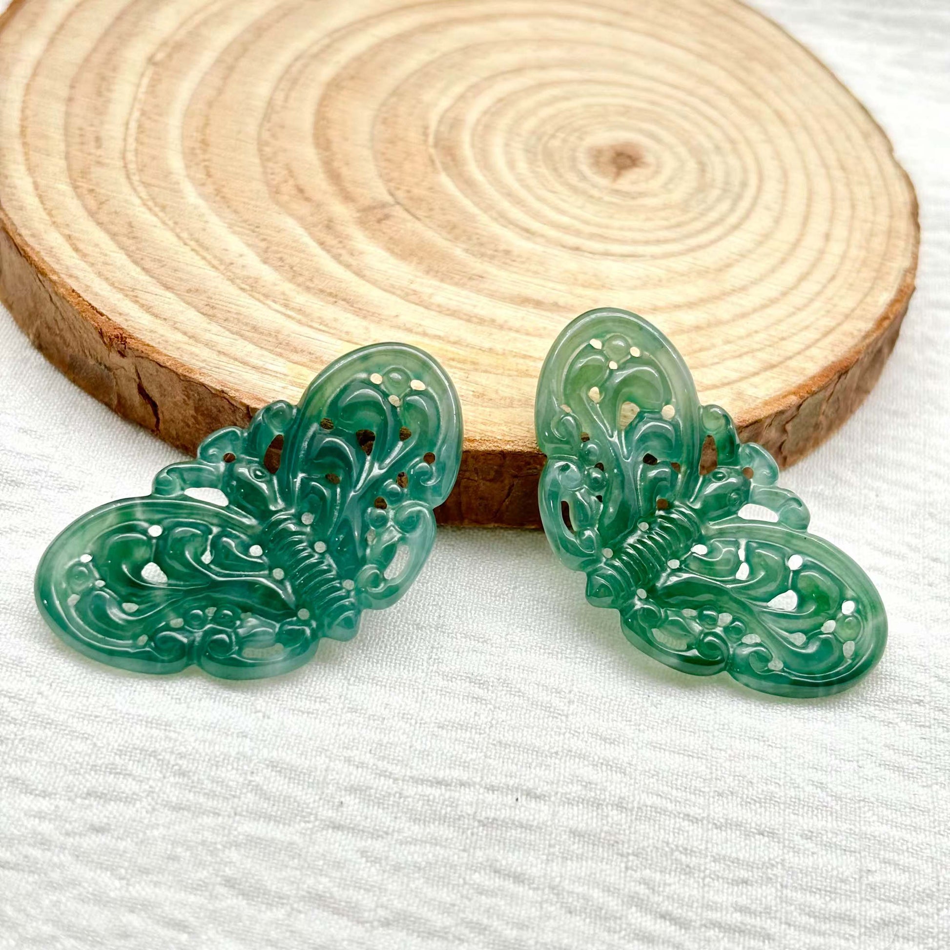 This jade pendant is hand-carved and polished.