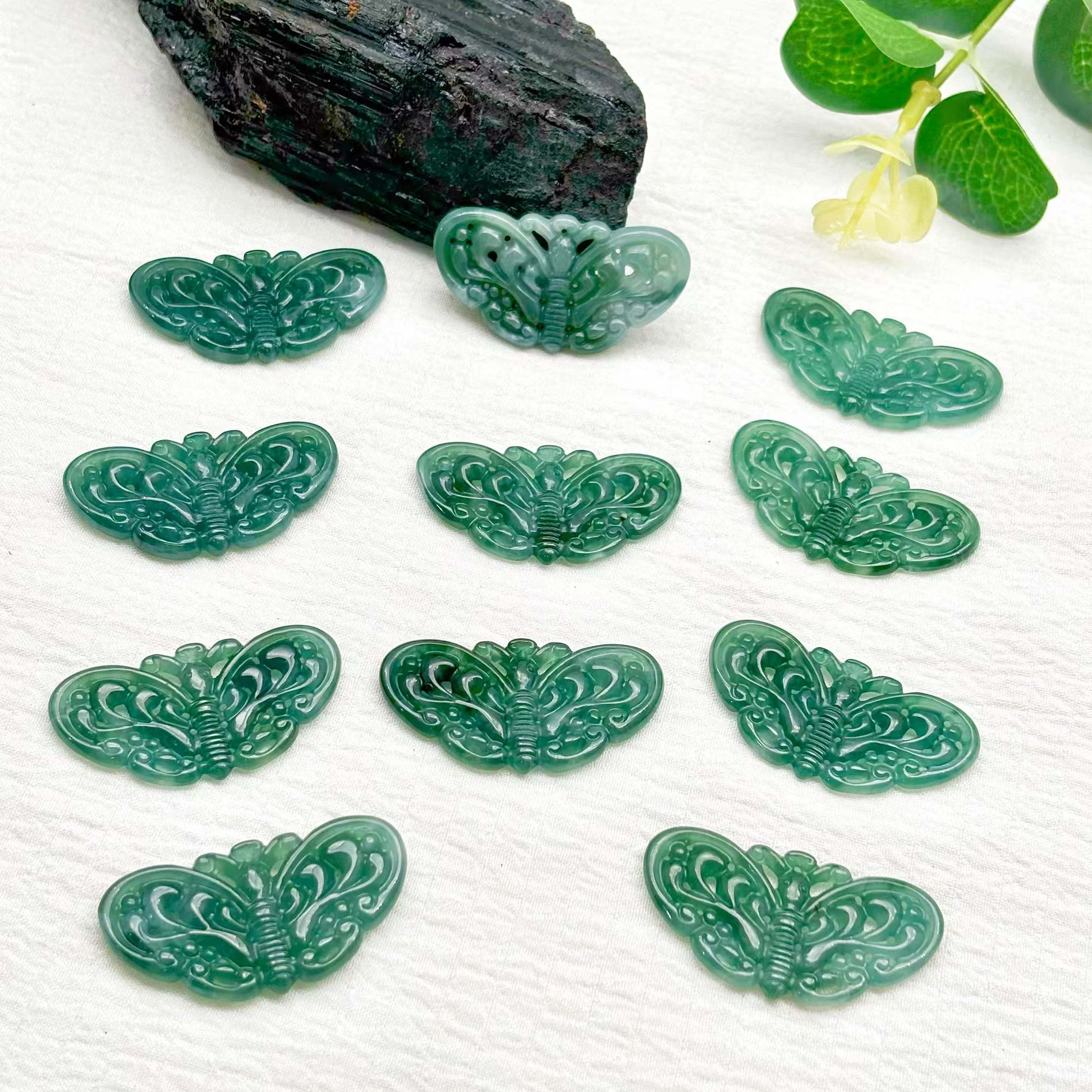 This jade pendant is hand-carved and polished.